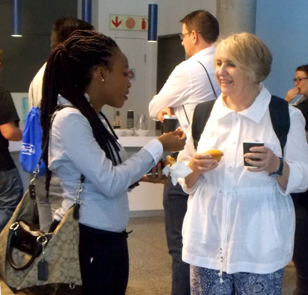 R enthusiasts connecting over a cuppa at satRday. Image courtesy of Kirsty Lee Garson.
