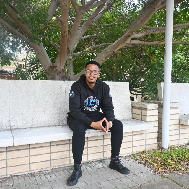 Person sat on a bench